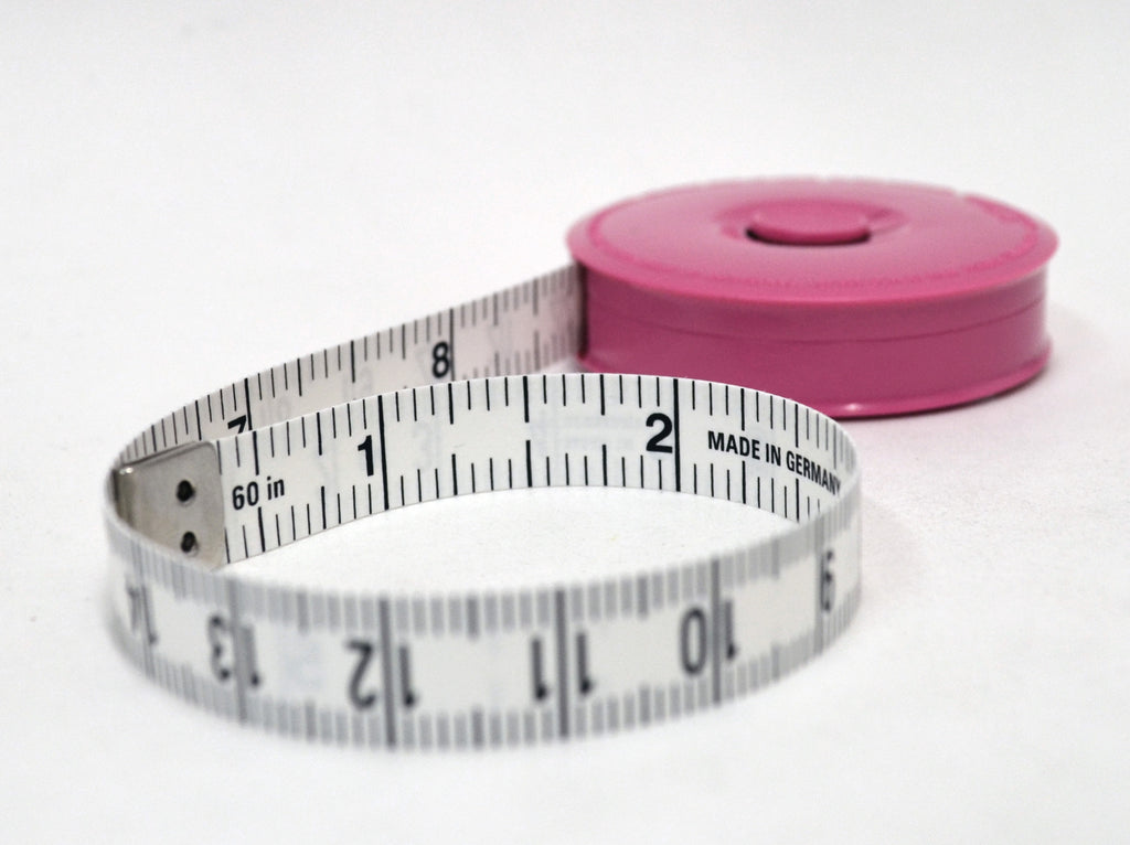 Pink tape measure at